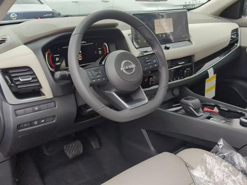 Deep Ocean Blue Pearl/Super Black 2024 Nissan Rogue SL