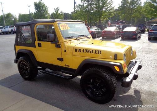 Yellow 2004 Jeep Wrangler SE