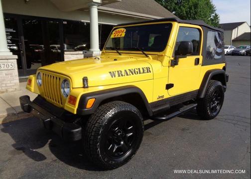 Yellow 2004 Jeep Wrangler SE