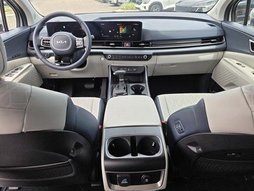 Ivory Silver 2026 Kia Carnival SX