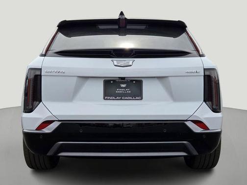 Vibrant White Tricoat 2026 Cadillac OPTIQ Premium Sport