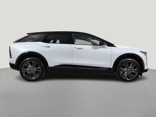 Vibrant White Tricoat 2026 Cadillac OPTIQ Premium Sport