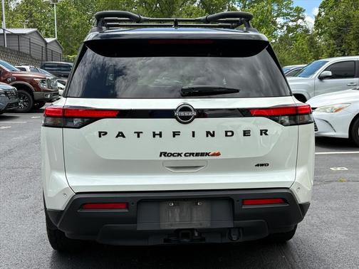 Pearl White Tricoat/Super Black 2024 Nissan Pathfinder Rock Creek 4WD