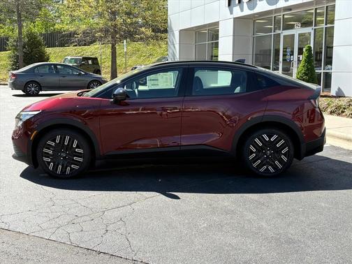 Coulis Red Metallic/Black 2026 Nissan Leaf PLATINUM+