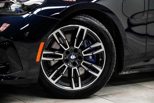 Carbon Black Metallic 2026 BMW 550e xDrive