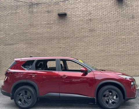 Scarlet Ember 2026 Nissan Rogue SV