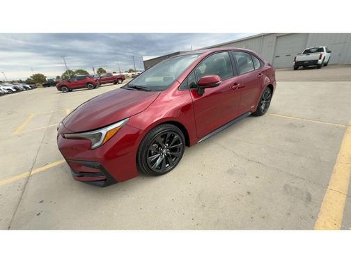 Ruby Flare Pearl 2026 Toyota Corolla Hybrid SE