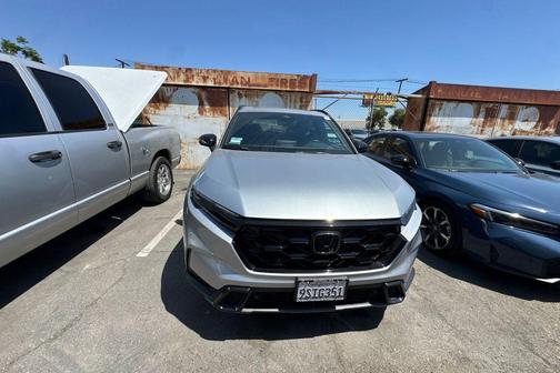 Solar Silver Metallic 2025 Honda CR-V Hybrid Sport-L