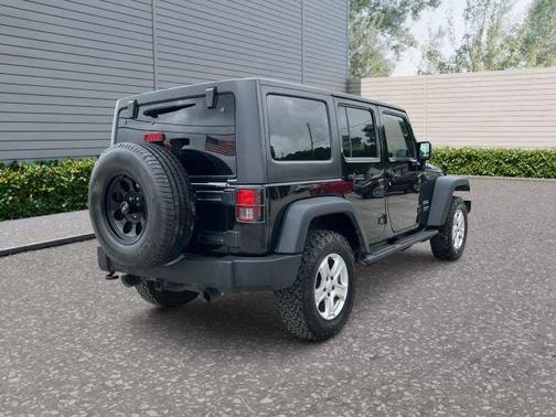 Black 2015 Jeep Wrangler Unlimited Sport