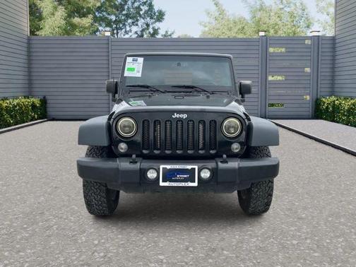Black 2015 Jeep Wrangler Unlimited Sport