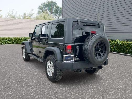 Black 2015 Jeep Wrangler Unlimited Sport