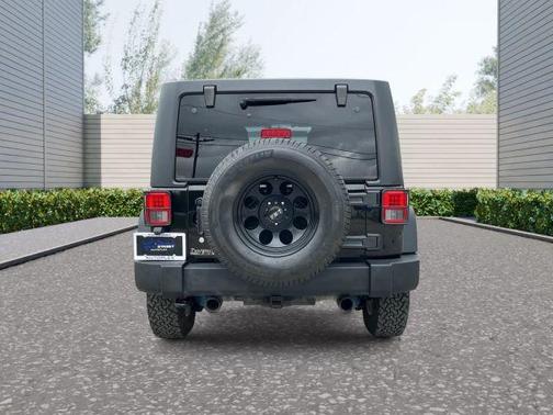 Black 2015 Jeep Wrangler Unlimited Sport