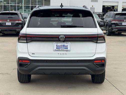 Pure White 2026 Volkswagen Taos 1.5T SE Black