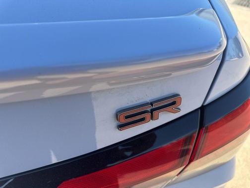 Gray Sky Pearl 2024 Nissan Versa 1.6 SR