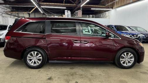 Purple 2014 Honda Odyssey EX-L