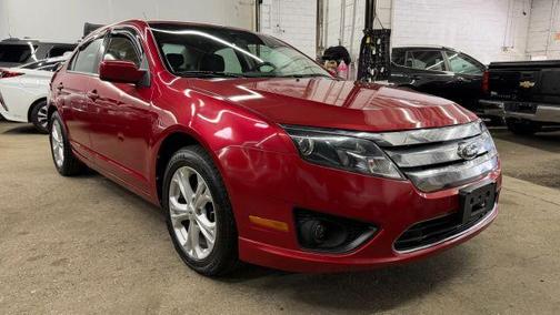Red 2012 Ford Fusion SE