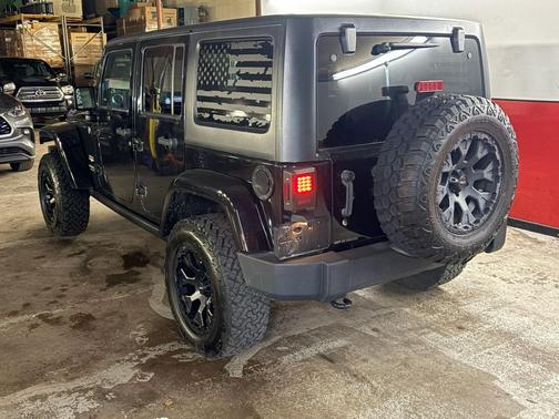 BLACK 2014 Jeep Wrangler Unlimited Freedom Edition
