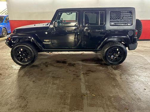 BLACK 2014 Jeep Wrangler Unlimited Freedom Edition