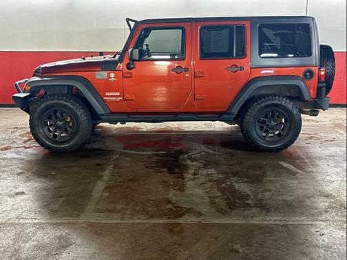 RED 2014 Jeep Wrangler Unlimited Sport