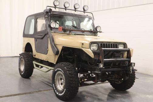 Tan 1994 Jeep Wrangler SE 4WD