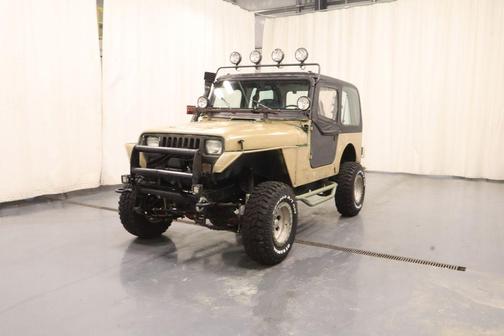 Tan 1994 Jeep Wrangler SE 4WD