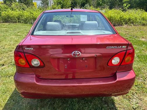 Impulse Red 2004 Toyota Corolla LE