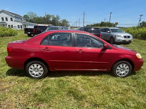 Impulse Red 2004 Toyota Corolla LE