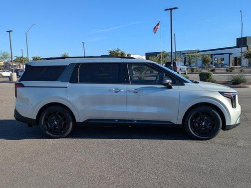 Ivory Silver 2026 Kia Carnival Hybrid SX Prestige