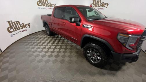 Volcanic Red Tintcoat 2026 GMC Sierra 1500 AT4X
