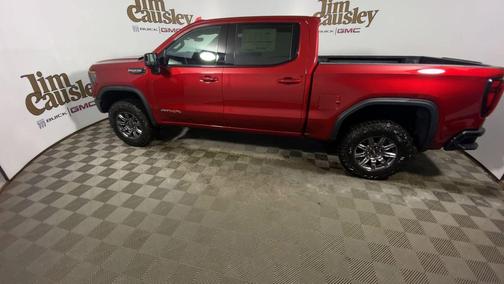 Volcanic Red Tintcoat 2026 GMC Sierra 1500 AT4X