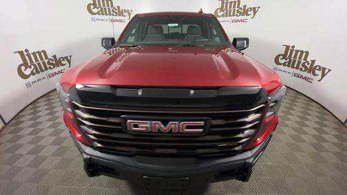 Volcanic Red Tintcoat 2026 GMC Sierra 1500 AT4X