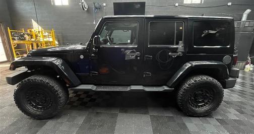 Black 2014 Jeep Wrangler Unlimited Altitude