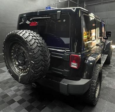 Black 2014 Jeep Wrangler Unlimited Altitude