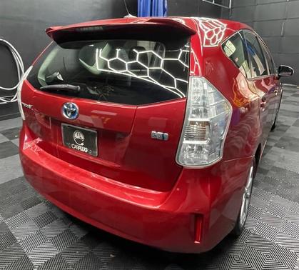 Red 2012 Toyota Prius v TWO/THREE/FIVE