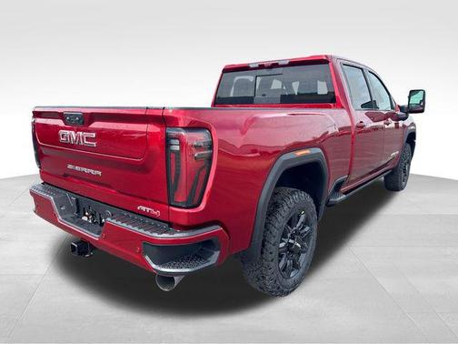 Volcanic Red Tintcoat 2026 GMC Sierra 2500 AT4