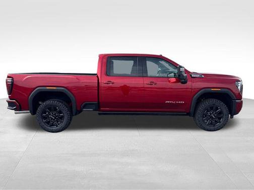 Volcanic Red Tintcoat 2026 GMC Sierra 2500 AT4