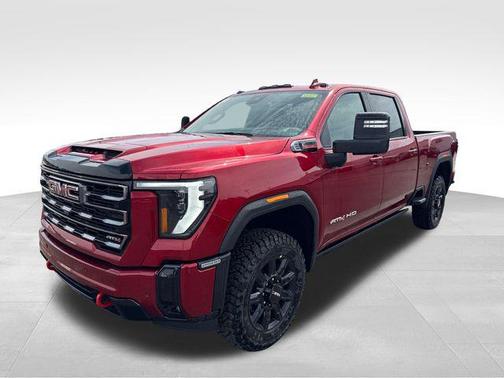 Volcanic Red Tintcoat 2026 GMC Sierra 2500 AT4
