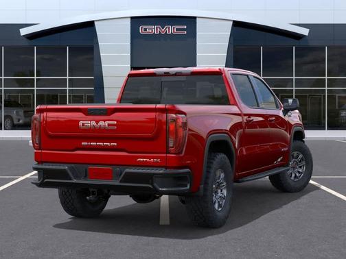 Volcanic Red Tintcoat 2026 GMC Sierra 1500 AT4X
