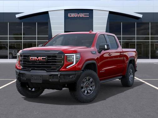 Volcanic Red Tintcoat 2026 GMC Sierra 1500 AT4X