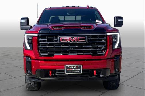Volcanic Red Tintcoat 2025 GMC Sierra 2500 AT4