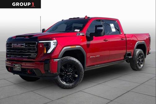Volcanic Red Tintcoat 2025 GMC Sierra 2500 AT4
