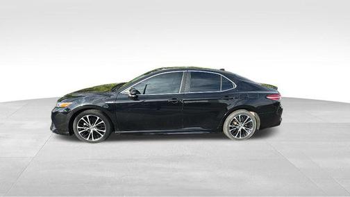 Midnight Black Metallic 2019 Toyota Camry Hybrid SE