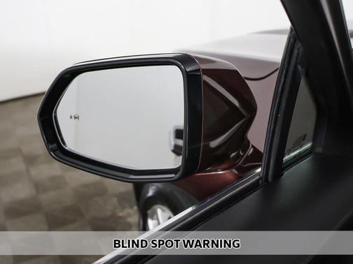 Rosewood Metallic 2023 Cadillac XT4 Luxury