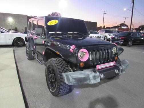 Black 2012 Jeep Wrangler Unlimited Sahara