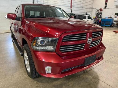 Red 2014 RAM 1500 Sport