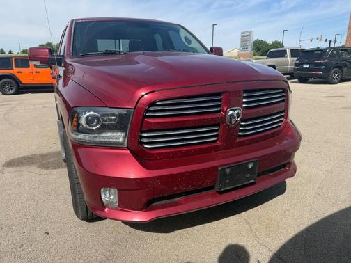 Red 2014 RAM 1500 Sport