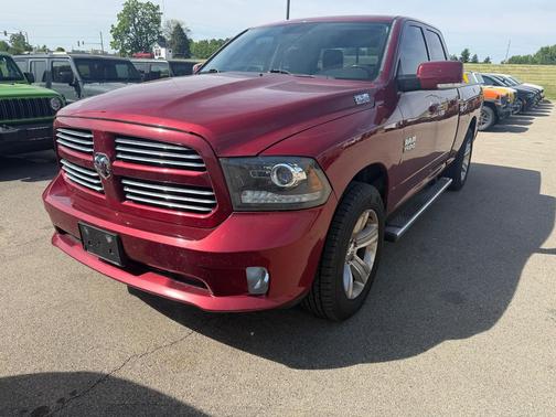 Red 2014 RAM 1500 Sport
