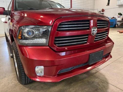 Red 2014 RAM 1500 Sport