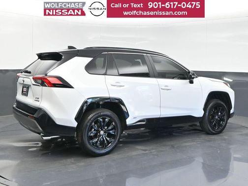 Wind Chill Pearl/Midnight Black Metallic 2023 Toyota RAV4 Hybrid SE