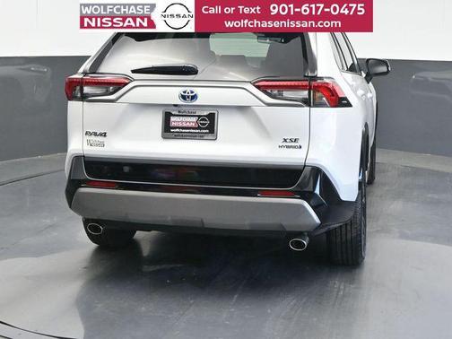 Wind Chill Pearl/Midnight Black Metallic 2023 Toyota RAV4 Hybrid SE